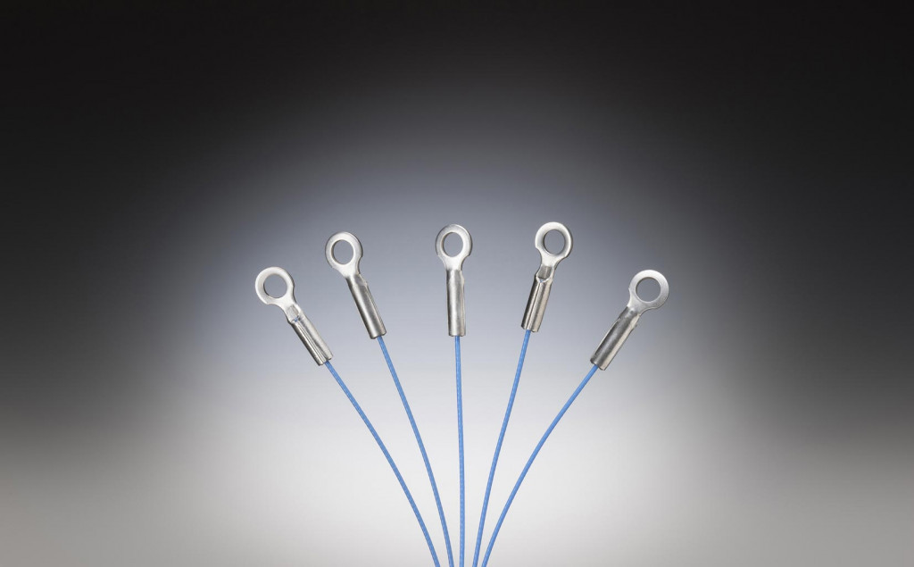 Miniature coated eye fitting cable assembly